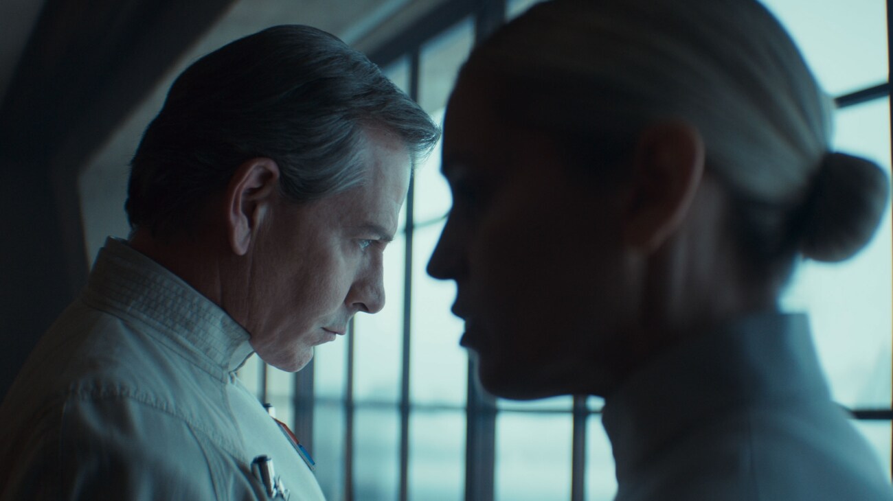 (L-R) Director Orson Krennic (Ben Mendelsohn) and Supervisor Dedra Meero (Denise Gough) in Lucasfilm's ANDOR Season 2, exclusively on Disney+. Photo courtesy of Lucasfilm. ©2025 Lucasfilm Ltd. & TM. All Rights Reserved.