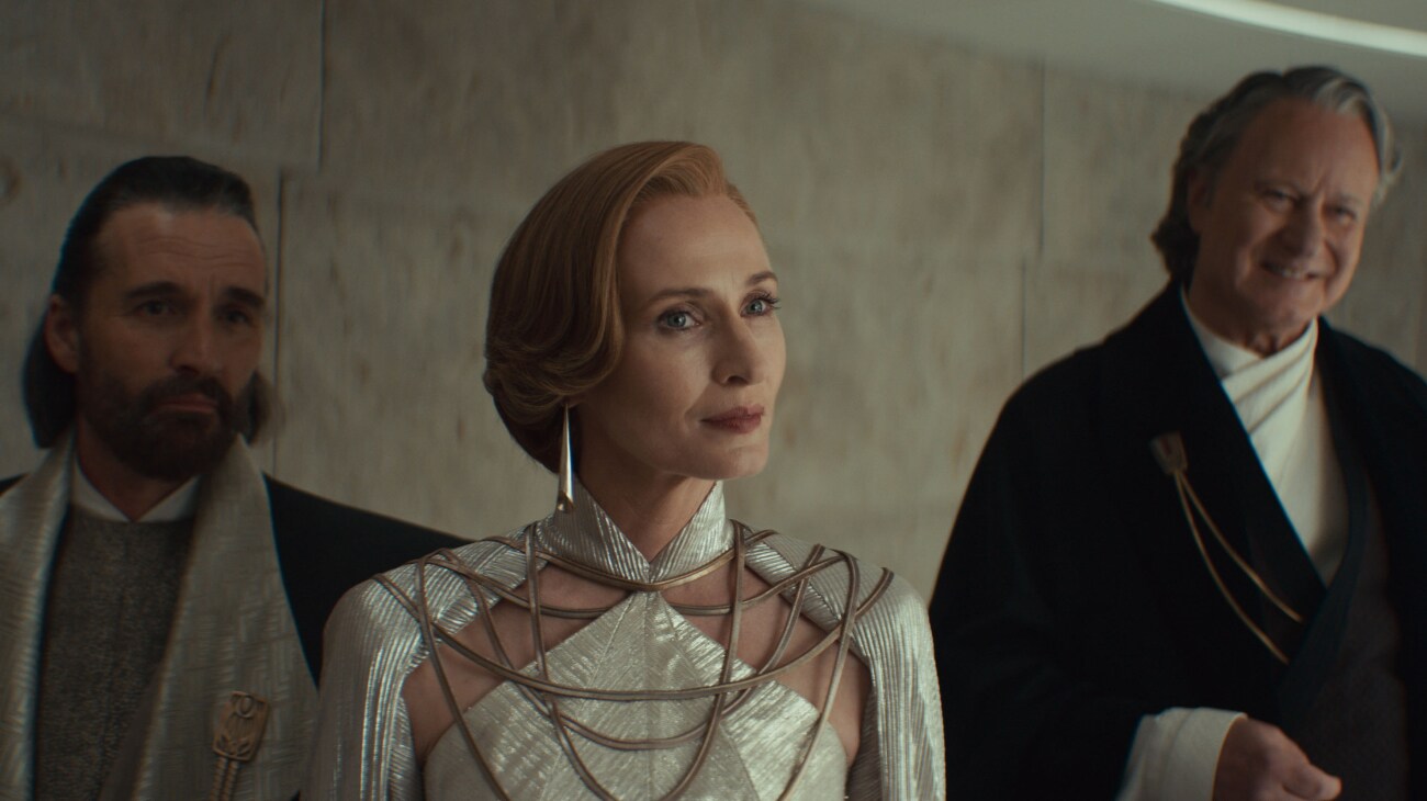 (L-R) Perrin Fertha (Allistair Mackenzie), Mon Mothma (Genevieve O'Reilly) and Luthen Rael (Stellan Skarsgård) in Lucasfilm's ANDOR Season 2, exclusively on Disney+. Photo courtesy of Lucasfilm. ©2025 Lucasfilm Ltd. & TM. All Rights Reserved.