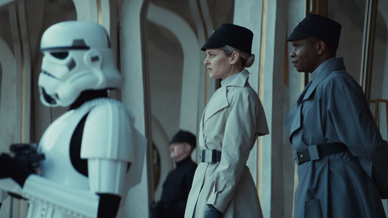 (Second from Left - R) Dedra Meero (Denise Gough) and Grymish (Kurt Egyiawan) in Lucasfilm's ANDOR Season 2, exclusively on Disney+. ©2025 Lucasfilm Ltd. & TM. All Rights Reserved.