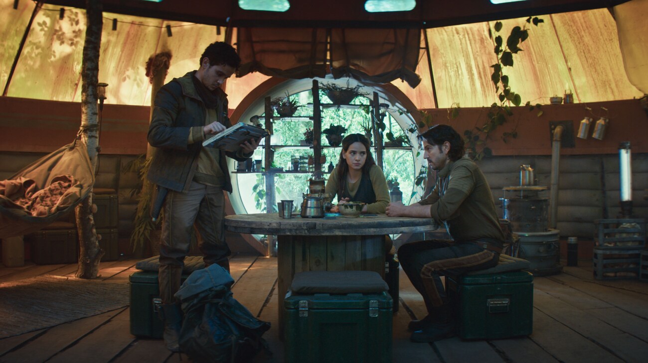 (L-R) Wilmon Paak (Muhannad Bhaier), Bix Caleen (Adria Arjona) and Cassian Andor (Diego Luna) in Lucasfilm's ANDOR Season 2, exclusively on Disney+. Photo courtesy of Lucasfilm. ©2025 Lucasfilm Ltd. & TM. All Rights Reserved.