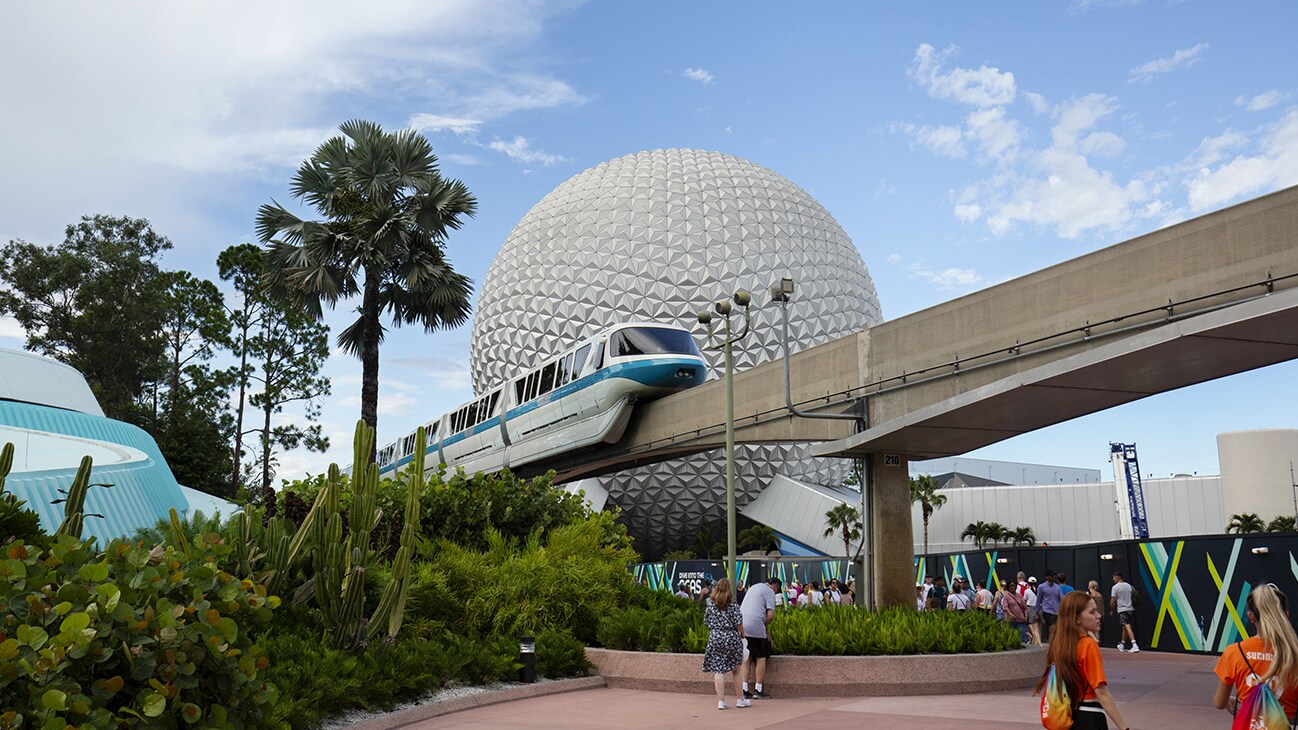 Image of the monorail passing by the EPCOT dome.