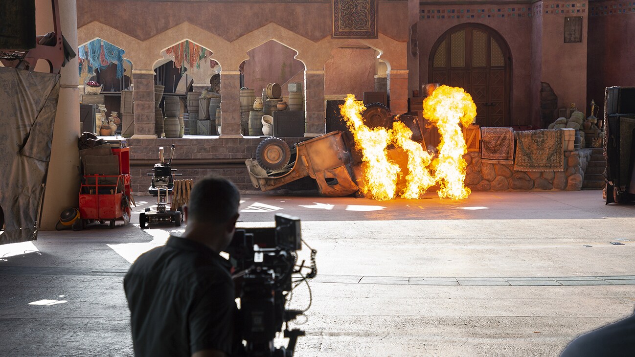 Image of a fire effect being filmed from the Indiana Jones Adventure ride.