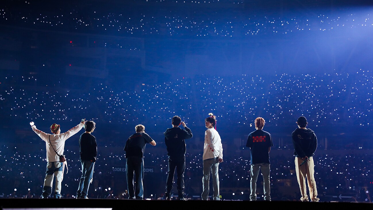 RM, Jin, SUGA, j-hope, Jimin, V and Jung Kook on stage from the Disney+ docuseries, "BTS Monuments: Beyond The Star."