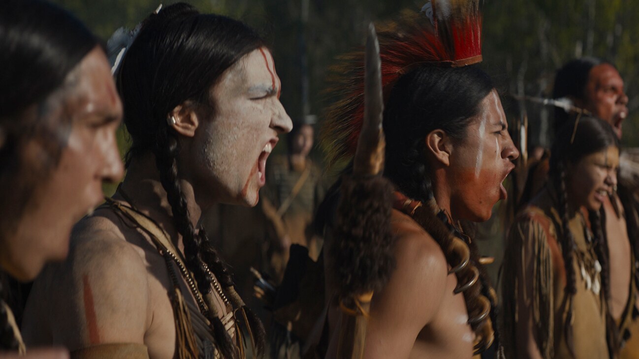 Image of several Native Americans yelling from the Hulu original movie, "Prey".