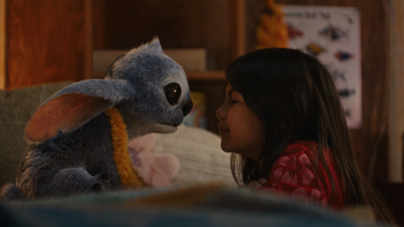 (L-R) Stitch and Maia Kealoha as Lilo in Disney’s live-action LILO & STITCH. Photo courtesy of Disney. © 2025 Disney Enterprises Inc. All Rights Reserved.