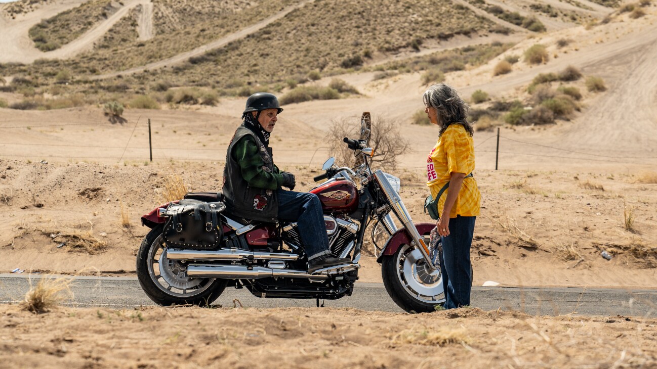 (L-R) Cheech Marin as Gil and Rose Portillo as Lidia in Disney's ALEXANDER AND THE TERRIBLE, HORRIBLE, NO GOOD, VERY BAD ROAD TRIP. Photo by Anna Kooris. © 2024 Disney Enterprises, Inc. All Rights Reserved.