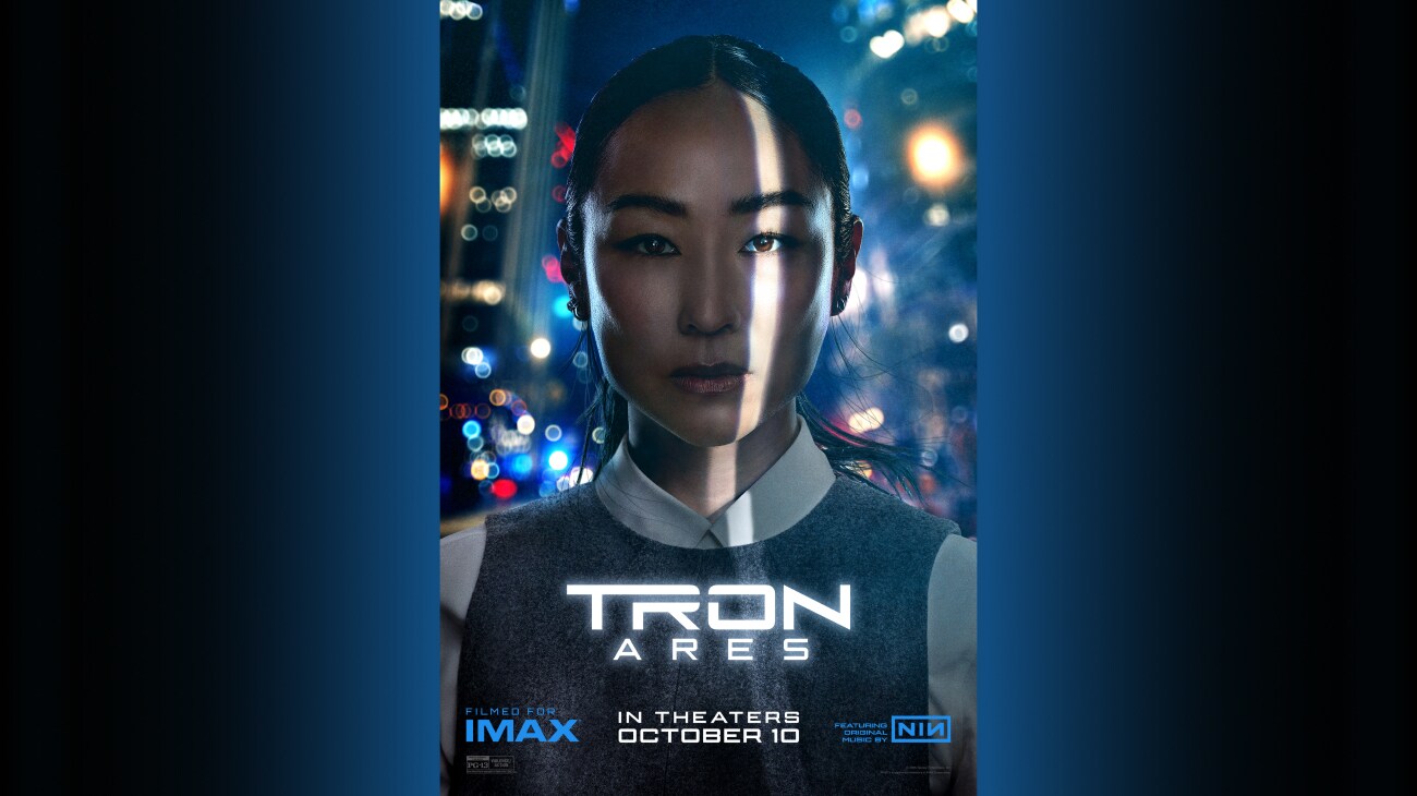 Image of Eve (Greta Lee) | Tron: Ares | In theaters October 10 | Filmed for IMAX | Featuring original music by NIN | Rated PG-13 |© 2025 Disney Enterprises, Inc. All Rights Reserved | poster image