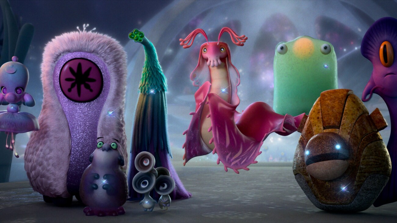 AMBASSADORS – When 11-year-old Elio (voice of Yonas Kibreab) is beamed up to space, he finds himself in the Communiverse, an interplanetary organization with representatives from galaxies far and wide. Like humans, the members of the Communiverse come in all shapes, sizes and personalities. Among them are Ambassador Mira (far left), Ambassador Helix (third from left), Ambassador Questa (center), Ambassador Tegman (third from right) and Ambassador Turais (second from right). Disney and Pixar’s “Elio” releases in theaters June 20, 2025. © 2025 Disney/Pixar. All Rights Reserved.