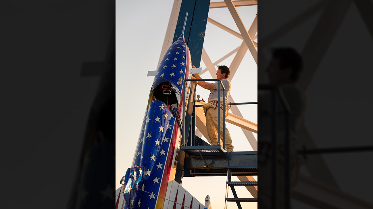 Picture of Eddie Braun inspecting a rocket on a launch pad from the Disney+ Originals movie Stuntman. (Disney/ Steve Dondero)