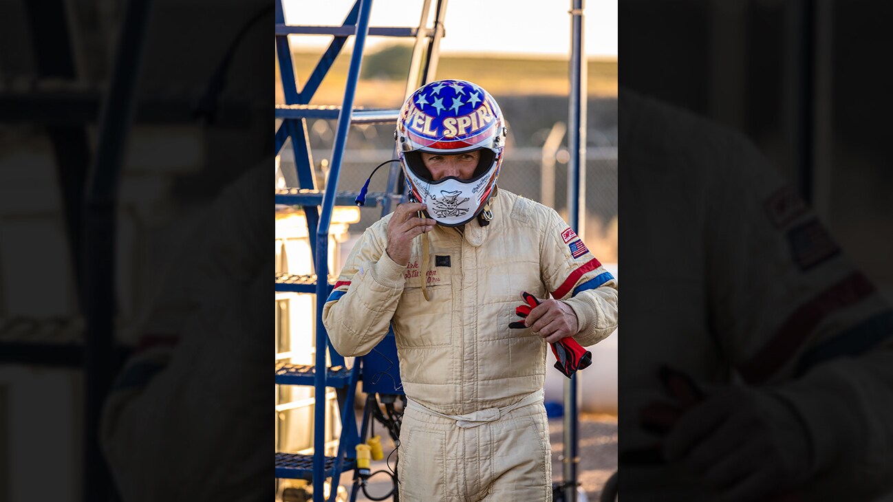 Picture of Eddie Braun in racing uniform and helmet from the Disney+ Originals movie Stuntman. (Disney/ Steve Dondero)