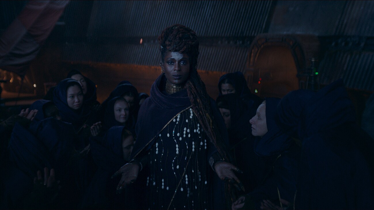 (Center): Mother Aniseya (Jodie Turner-Smith) in Lucasfilm's THE ACOLYTE, exclusively on Disney+. ©2024 Lucasfilm Ltd. & TM. All Rights Reserved.