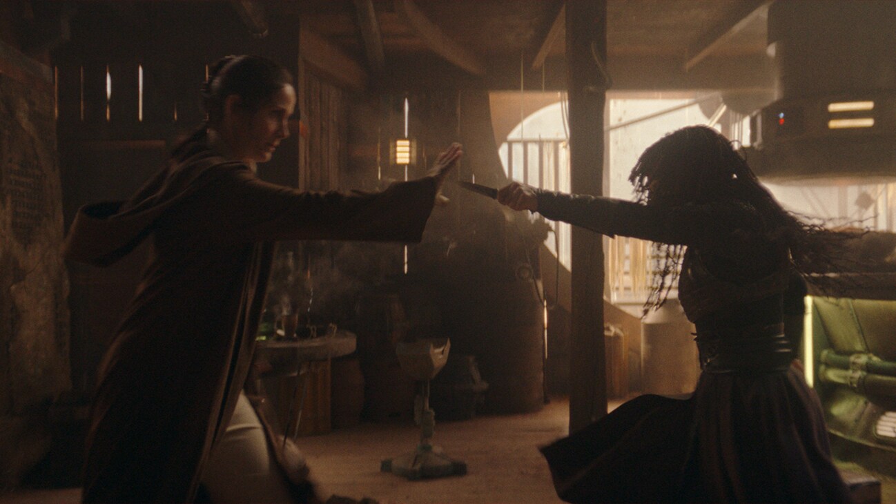 (L-R): Jedi Master Indara (Carrie-Anne Moss) and Mae (Amandla Stenberg) in Lucasfilm's THE ACOLYTE, exclusively on Disney+. ©2024 Lucasfilm Ltd. & TM. All Rights Reserved.