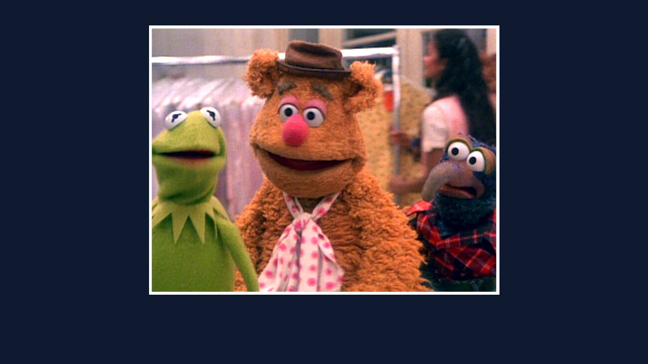 Kermit, Fozzie, and Gonzo from the Disney movie The Great Muppet Caper.