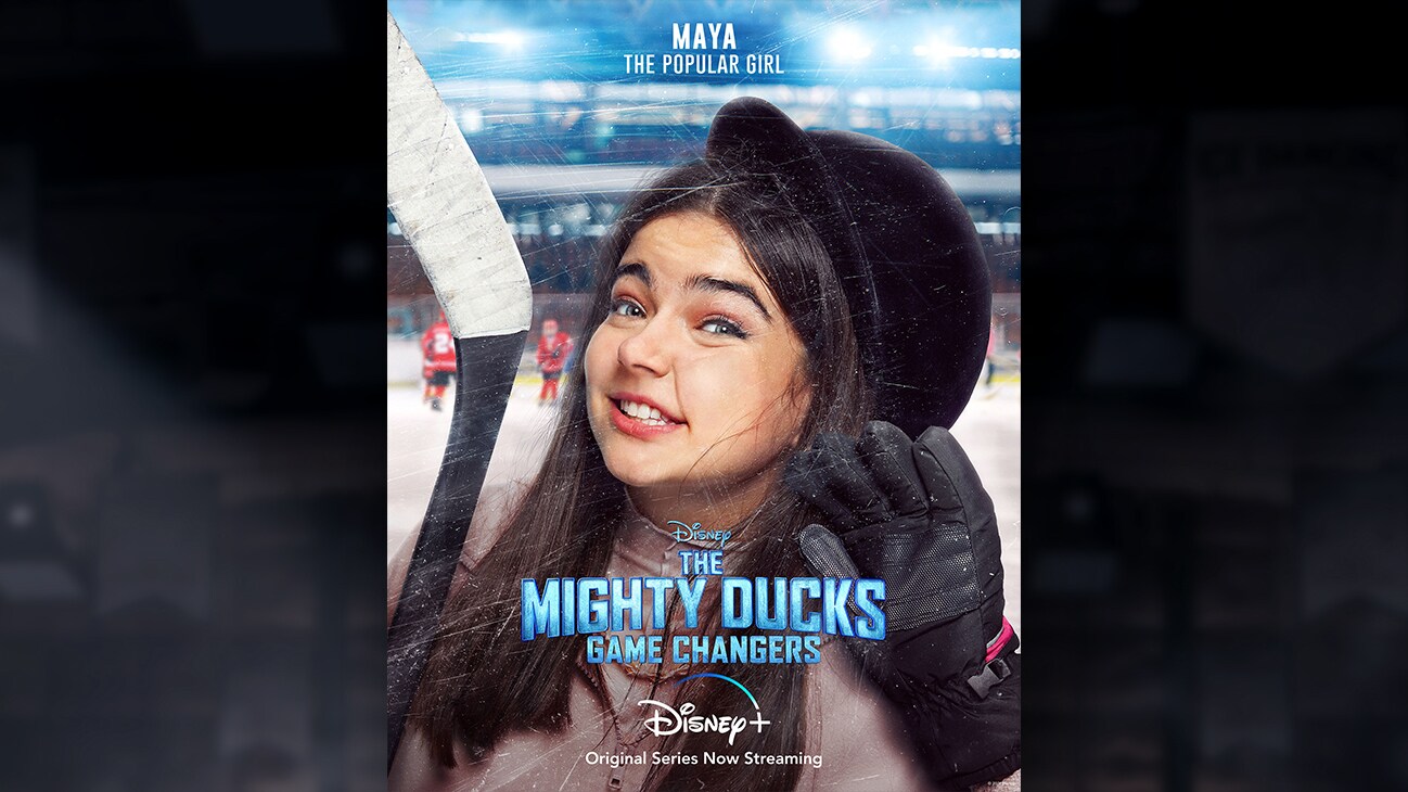 Maya | The Popular Girl | Image of Maya's face pressed against the hockey rink glass, from the Disney+ Original Series The Mighty Ducks: Game Changers.