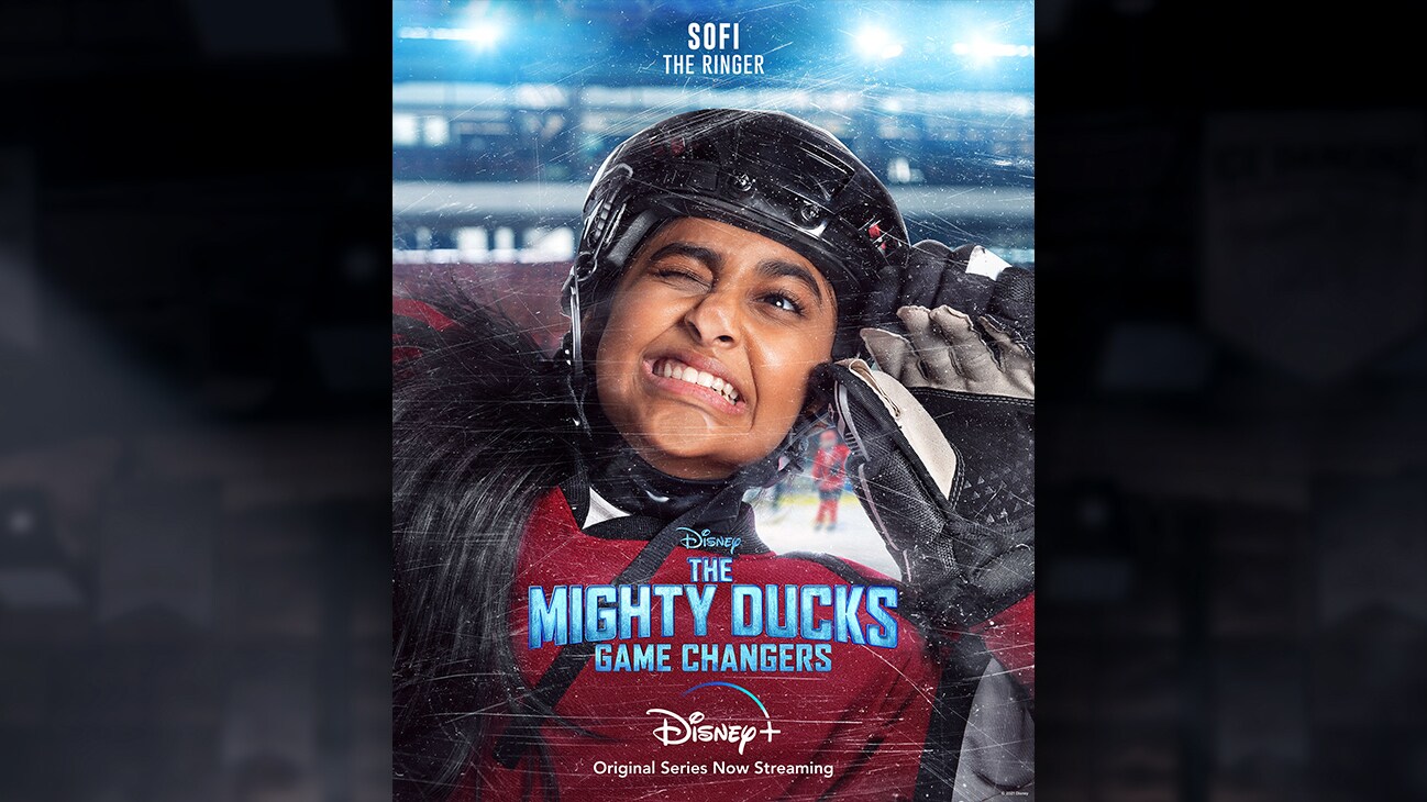 Sofi | The Ringer | Image of Sofi's face pressed against the hockey rink glass, from the Disney+ Original Series The Mighty Ducks: Game Changers.