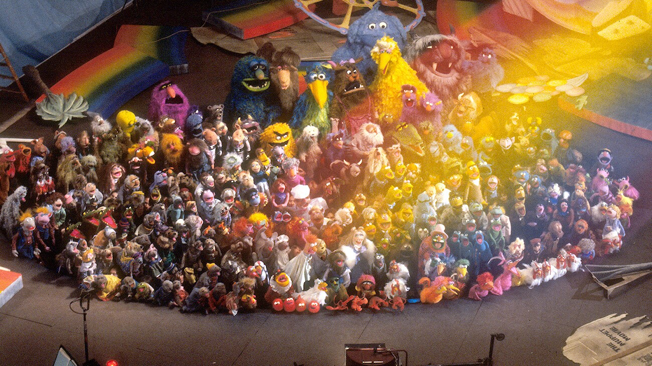 All the Muppets Singing behind a rainbow in the movie The Muppet Movie