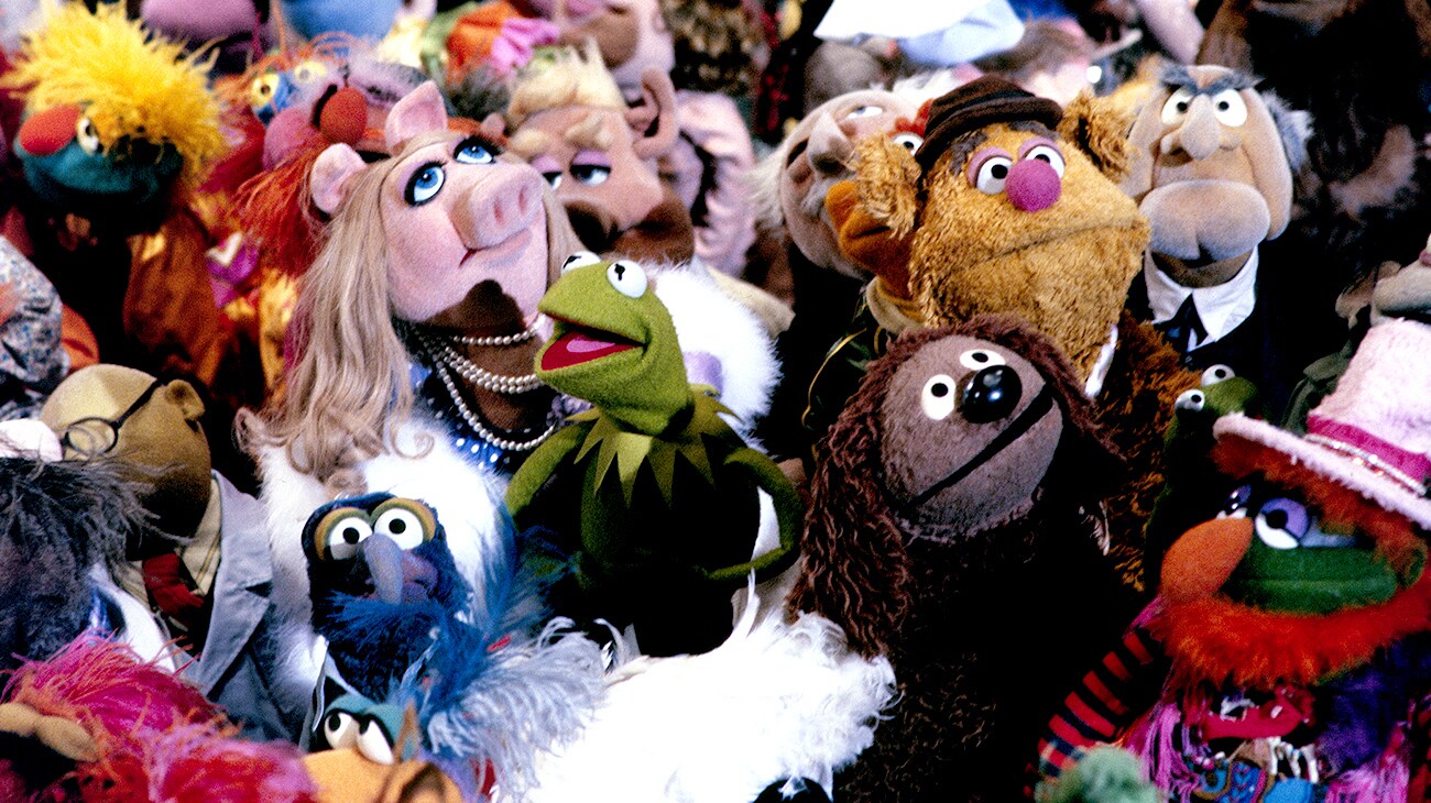 Several Muppets all gathered in a crowd