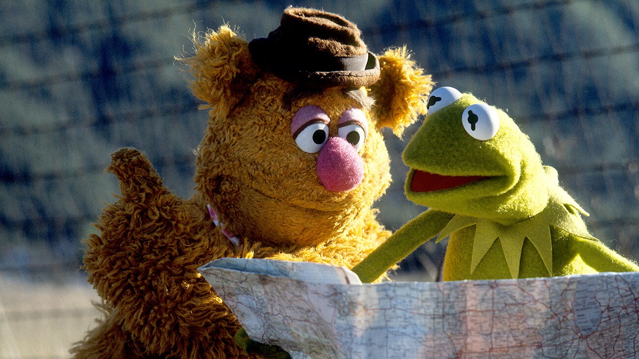 Fozzie the Bear and Kermit the Frog looking at a map in The Muppet Movie