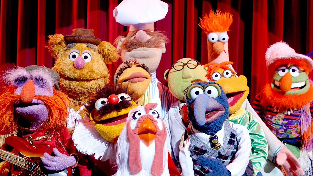 A group of muppets looking shocked