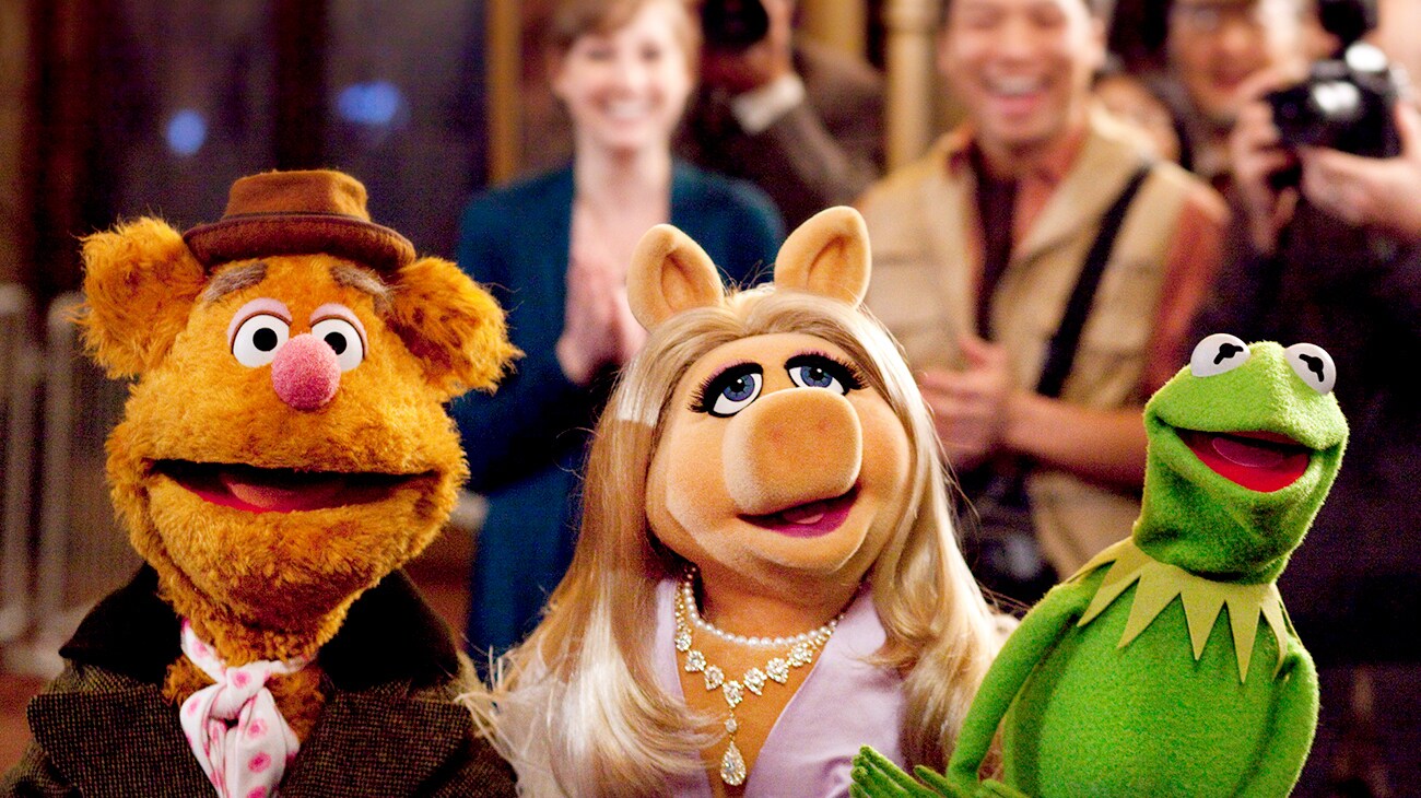 Fozzie the Bear Miss Piggy and Kermit the frog posing