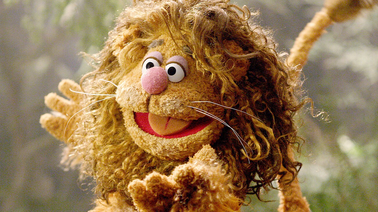 Fozzie the Bear as the Cowardly Lion in the Muppets' Wizard Oz.