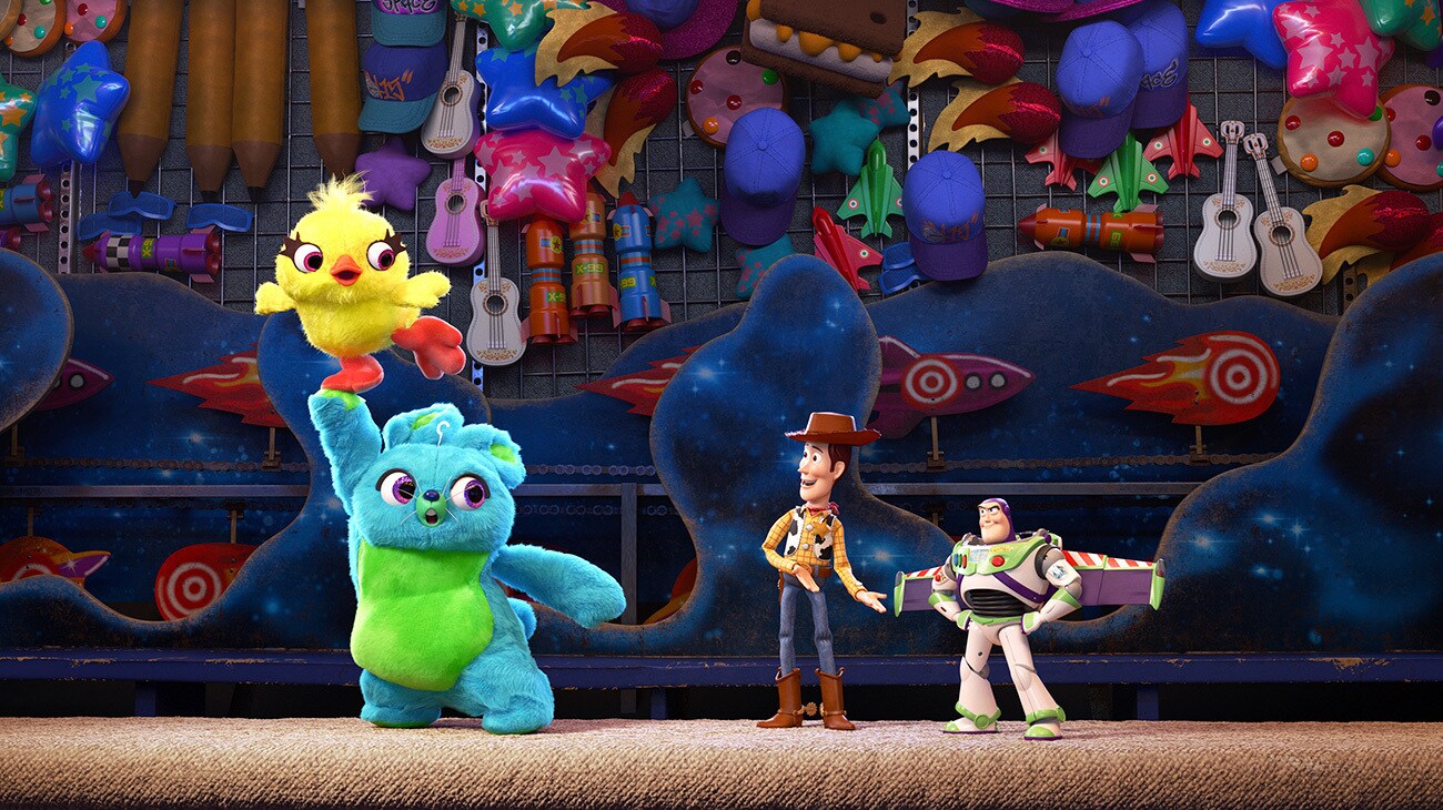 Ducky, Bunny, Woody and Buzz at the carnival in the animated movie "Toy Story 4"