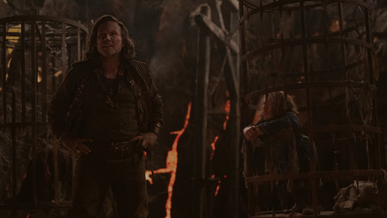 (L-R): Allagash (Christian Slater) and Willow Ufgood (Warwick Davis) in Lucasfilm's WILLOW exclusively on Disney+. ©2022 Lucasfilm Ltd. & TM. All Rights Reserved.