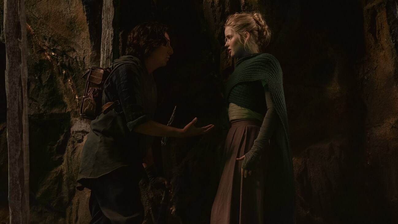 (L-R): Graydon (Tony Revolori) and Dove (Ellie Bamber) in Lucasfilm's WILLOW exclusively on Disney+. ©2022 Lucasfilm Ltd. & TM. All Rights Reserved.