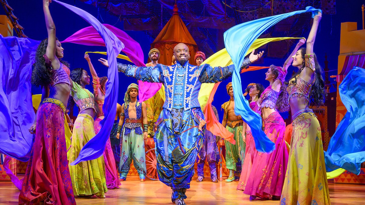 Genie among the Aladdin ensemble