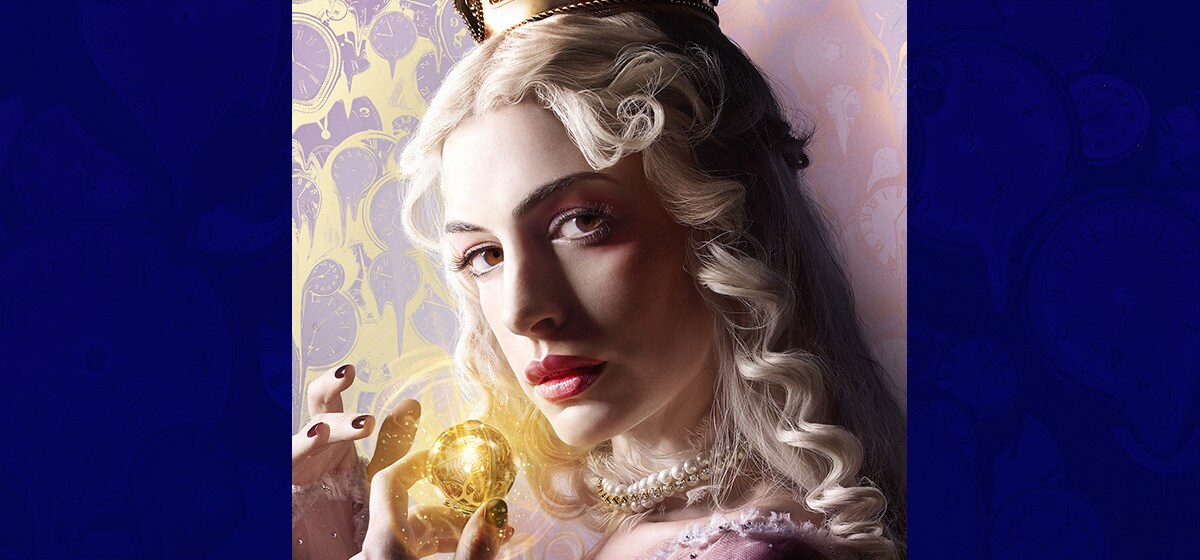Anne Hathaway as Mirana the White Queen holding a glowing ball in the movie "Alice Through the Looking Glass"