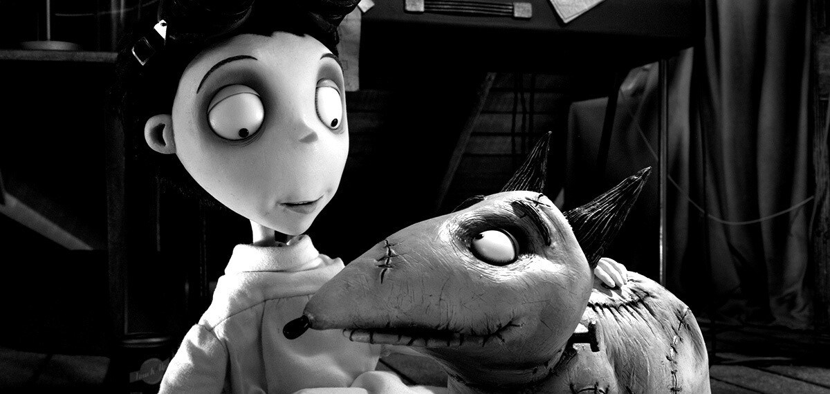 Victor voiced by Charlie Tahan and Sparky voiced by Frank Welker smiling at each other