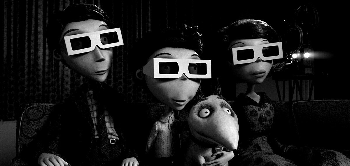 Victor and his family wearing 3d glasses with Sparky