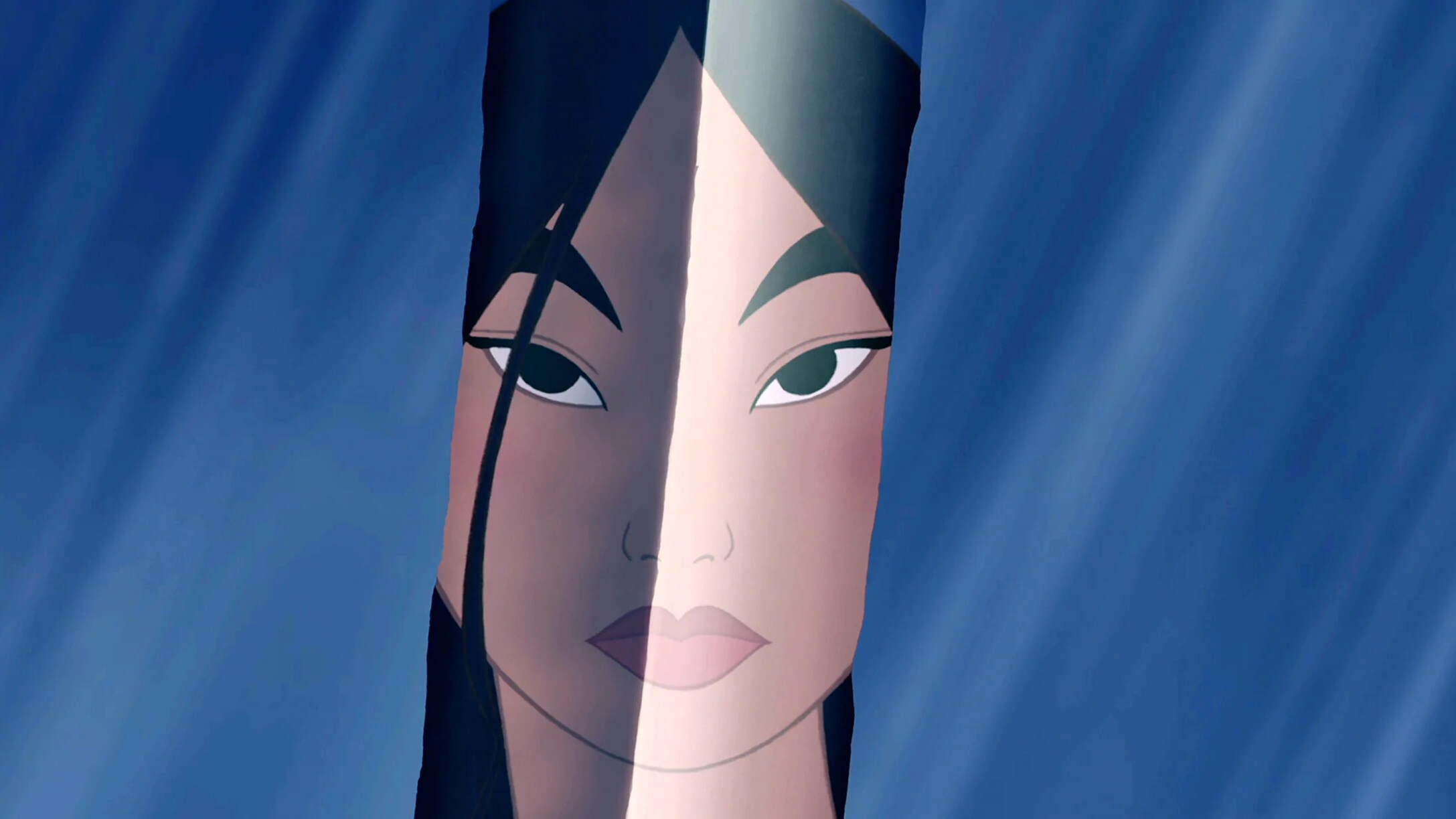 Mulan's reflection in her sword.