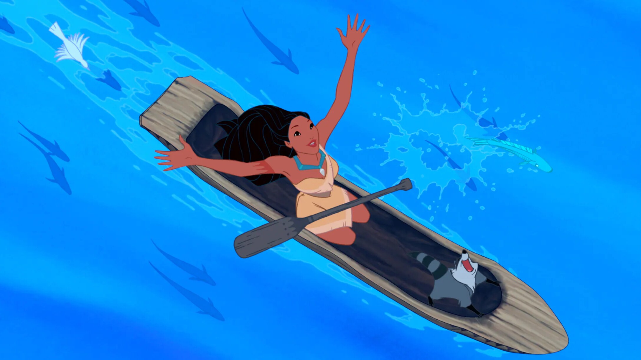 Pocahontas and Meeko enjoying a ride on the river.