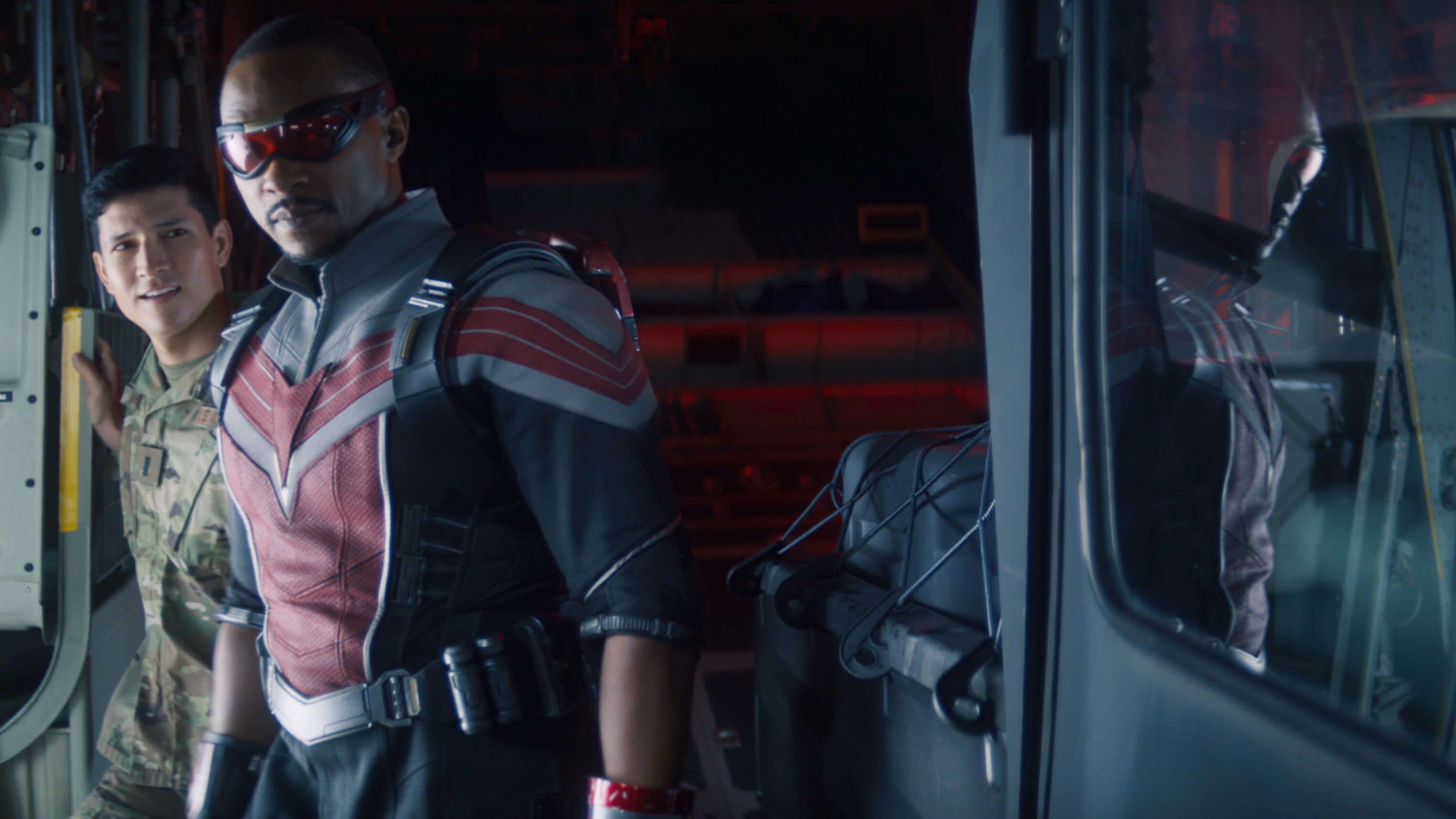 (Center): Falcon/Sam Wilson (Anthony Mackie) in Marvel Studios' THE FALCON AND THE WINTER SOLDIER exclusively on Disney+. Photo courtesy of Marvel Studios. ©Marvel Studios 2021. All Rights Reserved. 