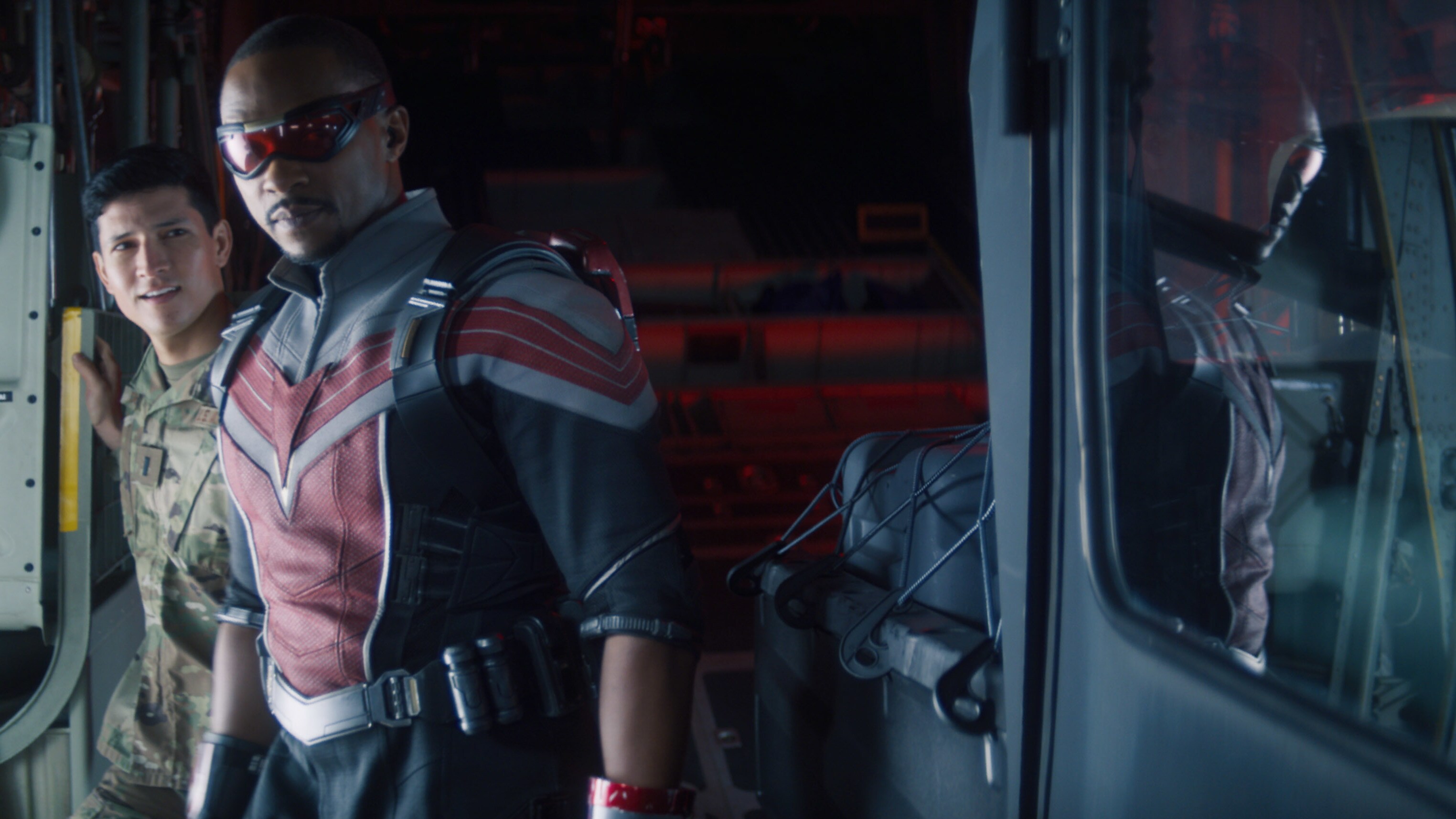 (Center): Falcon/Sam Wilson (Anthony Mackie) in Marvel Studios' THE FALCON AND THE WINTER SOLDIER exclusively on Disney+. Photo courtesy of Marvel Studios. ©Marvel Studios 2021. All Rights Reserved.