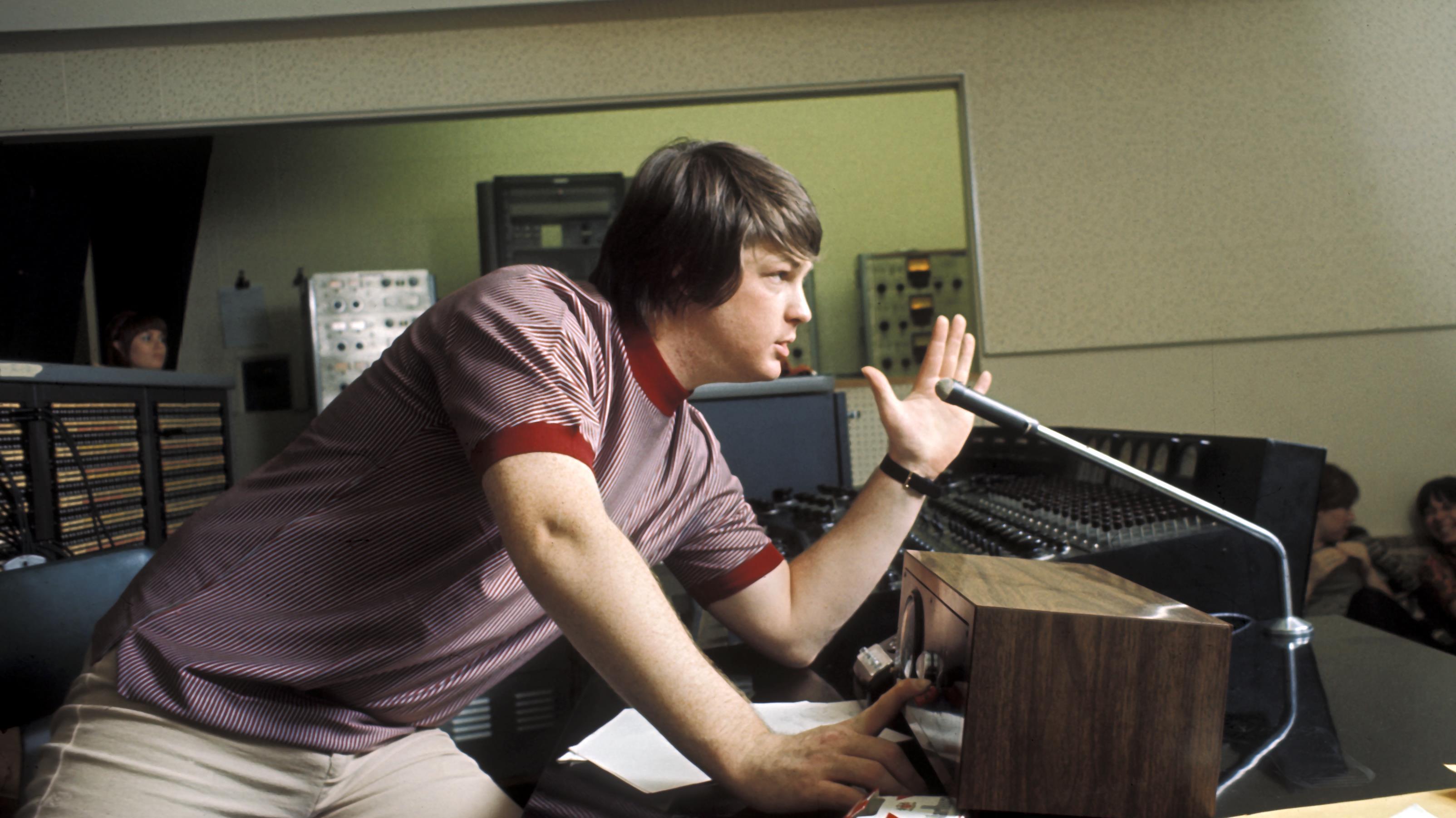 LOS ANGELES - 1966: Singer and mastermind Brian Wilson of the rock and roll band "The Beach Boys" directs from the control room while recording the album "Pet Sounds" in 1966 in Los Angeles, California. (Photo by Michael Ochs Archives/Getty Images)