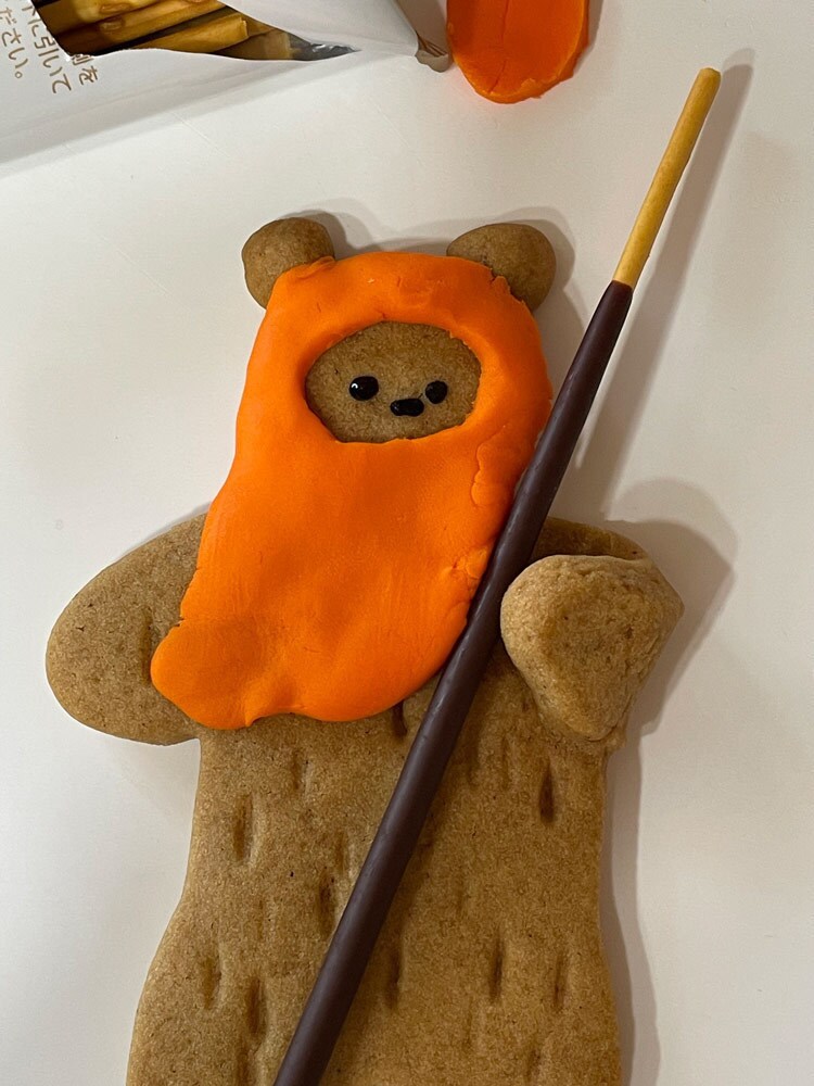 Gingerbread Ewok with hood and spear.