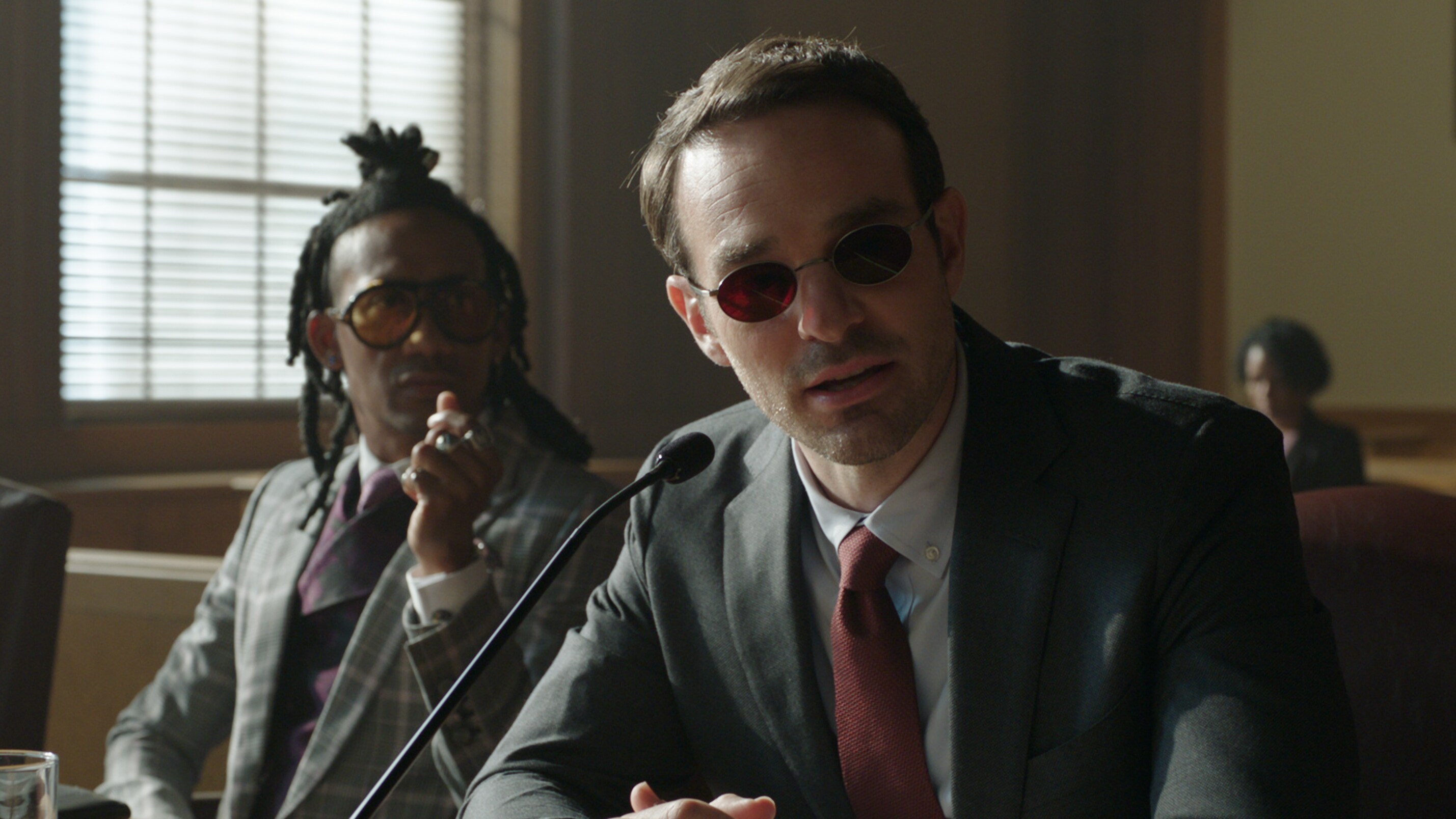 (L-R): Griffin Matthews as Luke Jacobson and Charlie Cox as Daredevil/Matt Murdock in Marvel Studios' She-Hulk: Attorney at Law, exclusively on Disney+. Photo courtesy of Marvel Studios. © 2022 MARVEL.