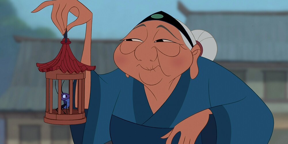 Character Grandmother Fa holding a caged cricket in the animated movie "Mulan"