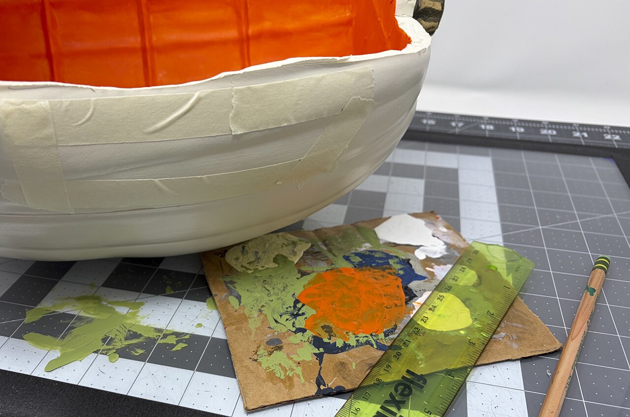 Step 5: Paint both stripes orange and let dry completely.