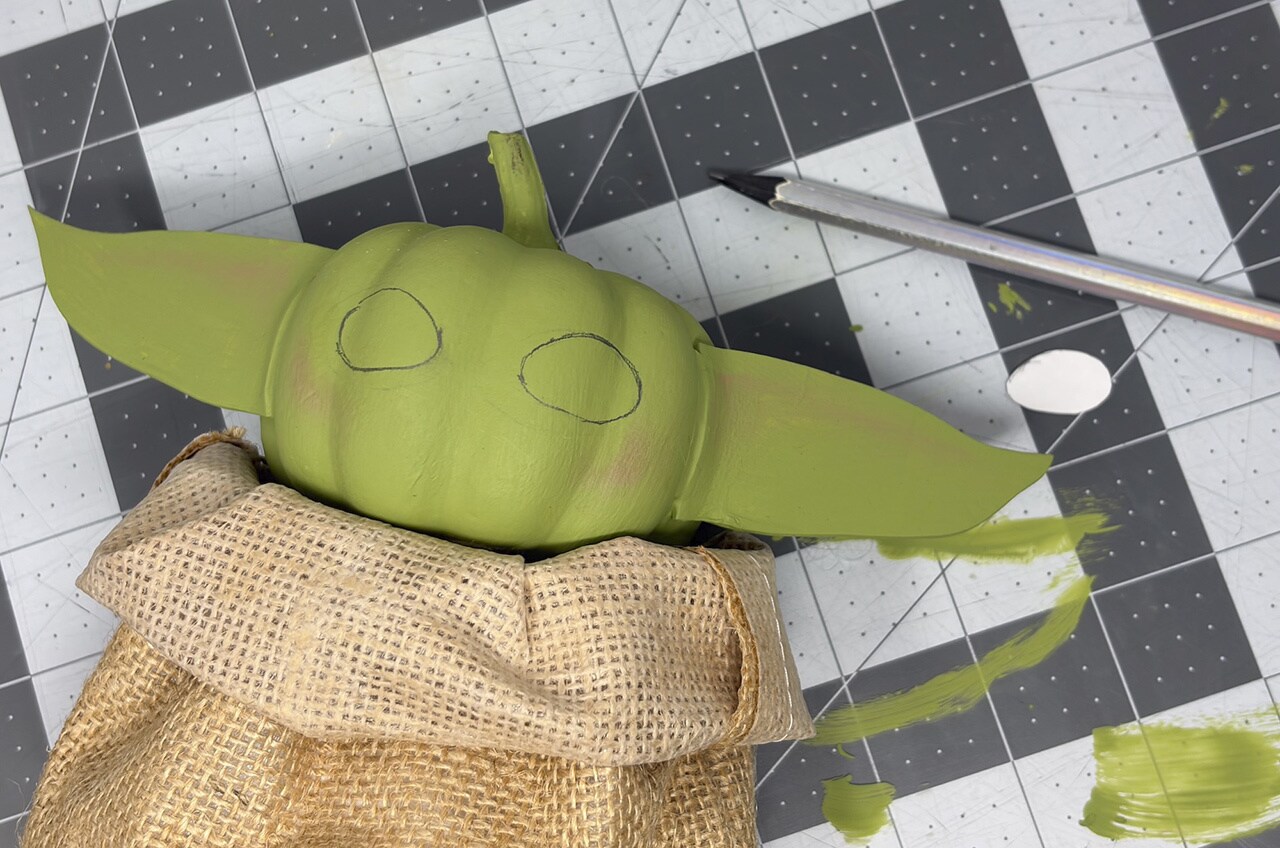 Step 15: Draw his mouth with a black permanent marker.