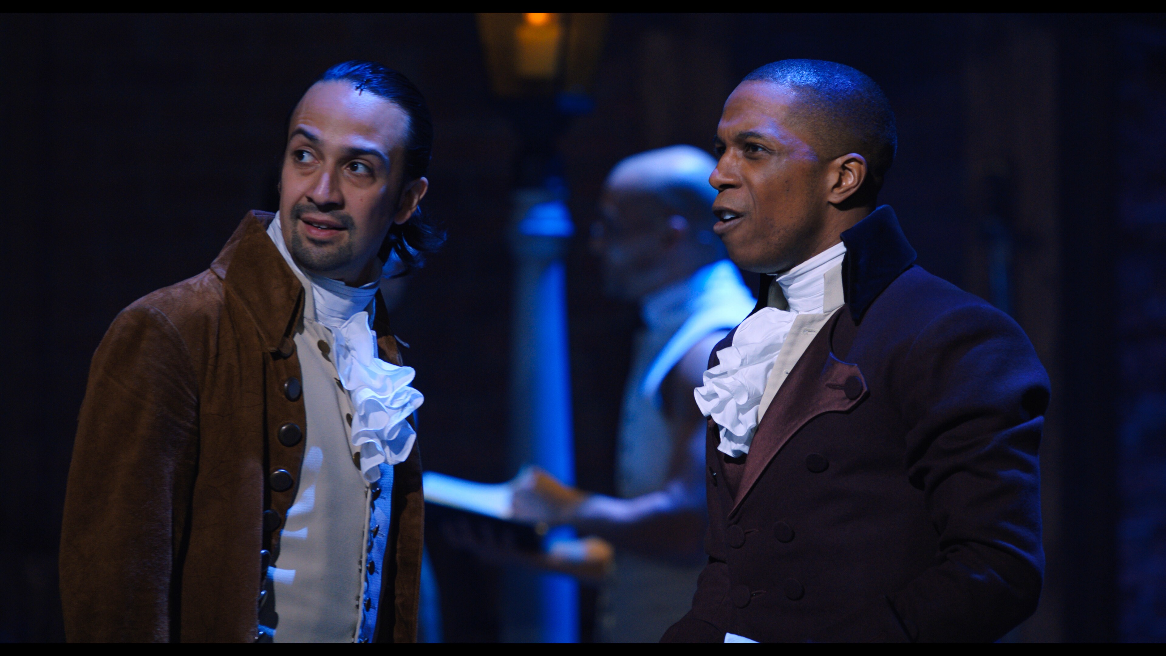 Lin-Manuel Miranda is Alexander Hamilton and Leslie Odom, Jr. is Aaron Burr in HAMILTON, the filmed version of the original Broadway production.