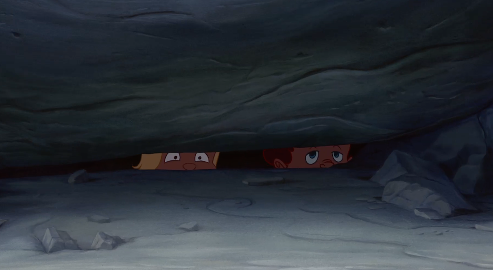 Hercules and his pal hiding in the animated movie "Hercules"