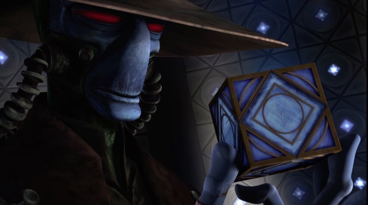 A Jedi Holocron in the hand of Cad Bane