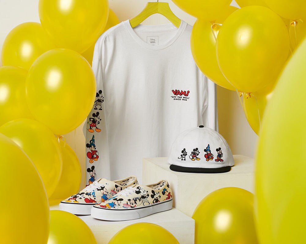 Mickey Mouse themed long-sleeve tee, Jockey hat, and Vans' original footwear 