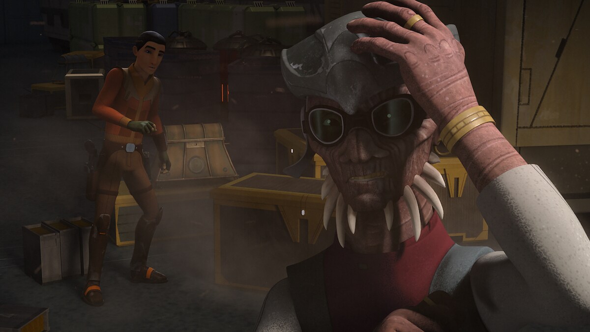 Hondo Ohnaka and Ezra Bridger standing in a cargo hold