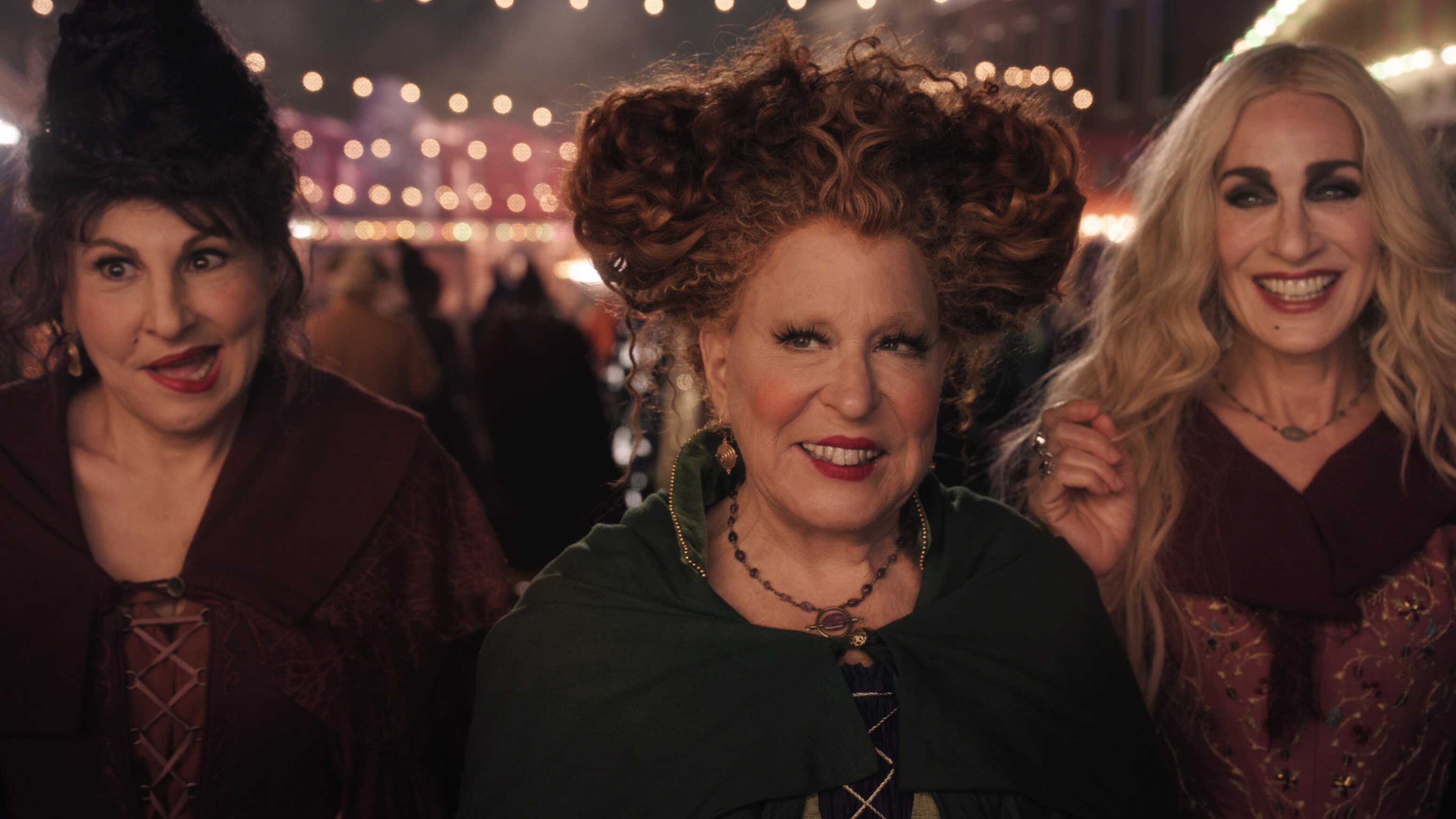 (L-R): Kathy Najimy as Mary Sanderson, Bette Midler as Winifred Sanderson, and Sarah Jessica Parker as Sarah Sanderson in Disney's live-action HOCUS POCUS 2, exclusively on Disney+. Photo courtesy of Disney Enterprises, Inc. © 2022 Disney Enterprises, Inc. All Rights Reserved.