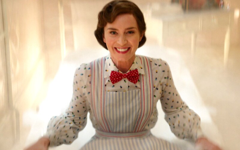 Mary Poppins wearing an apron and read bow tie