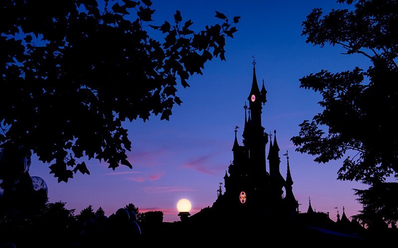 disneyland castle sunset